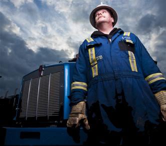 Truck Driver Beside Tractor